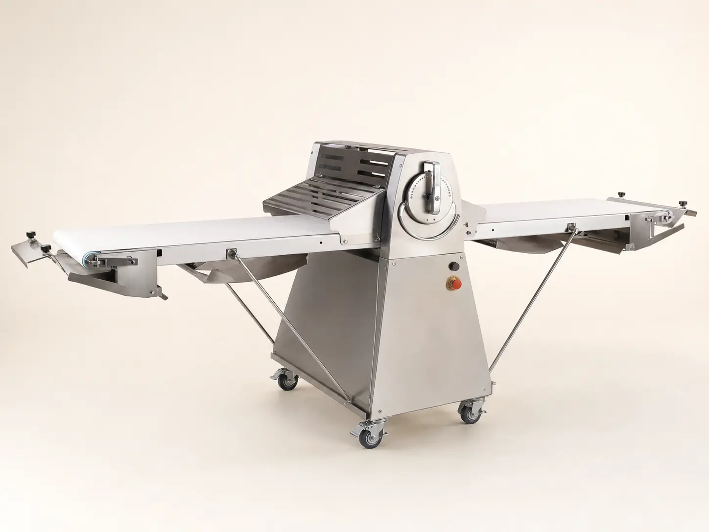 Reversible commercial dough sheeter with dual conveyor tables