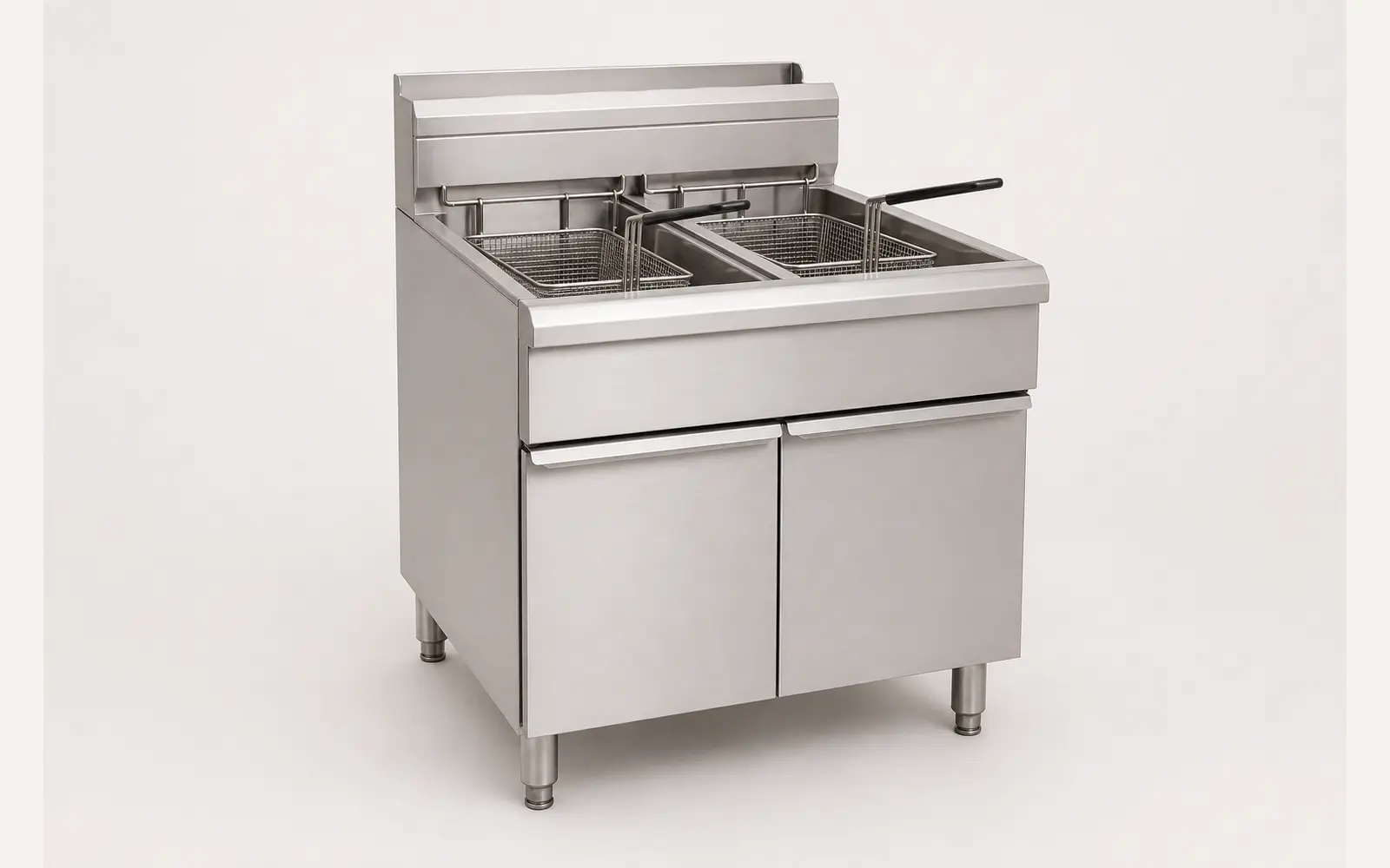Stainless steel floor-standing commercial deep fryer with two oil vats and fryer baskets
