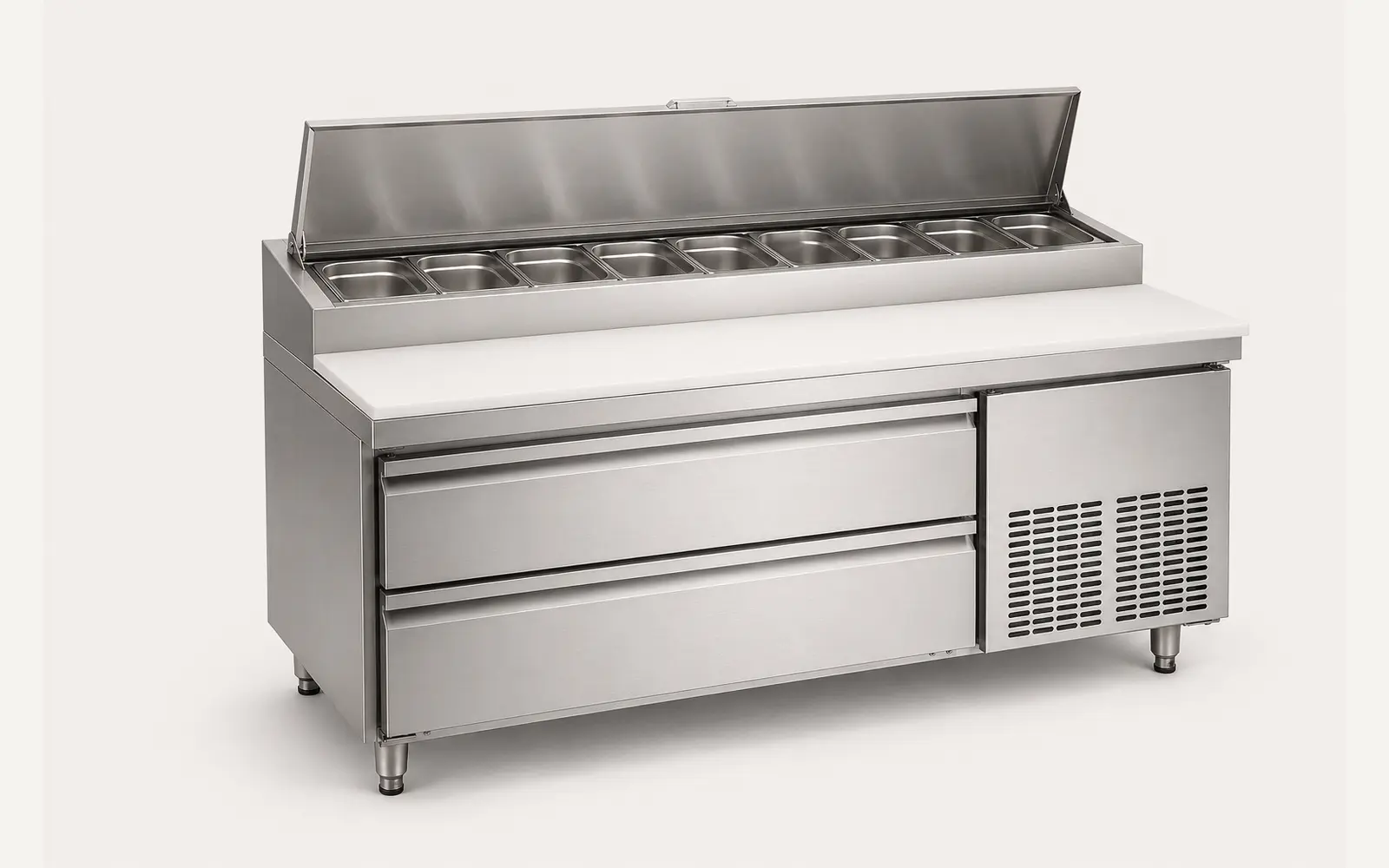 Stainless steel refrigerated pizza prep counter with ingredient pan rail, cutting board and drawer base